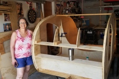 My helper, examining the working parts of the trailer. My half-tankard of water was used to ensure the shelf wasn't too short.