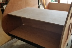 Test fitting the rear counter. This will end up being part of the counter and where our feet go when sleeping.