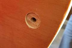 Hole drilled to receive lock bar
