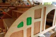 Starting to cut the insulation for the walls, using the template created last year.
