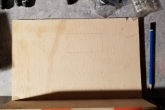 Marking the position of the battery load meter on the bulkhead.