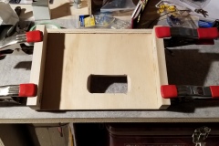 Hole cut for battery load meter.