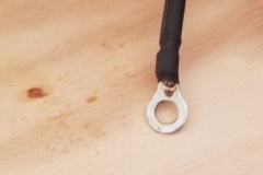 Hot accessory circuit lead, soldered, shrink wrapped and read for connection.