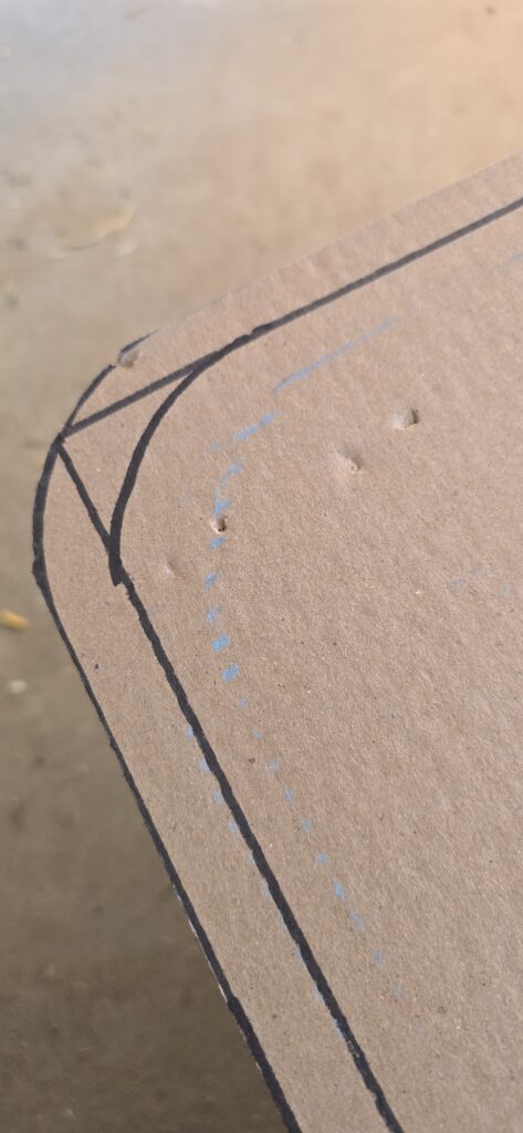 Chalk impression on cardboard. Note closely there are two lines. I used the outer line and added an inch.